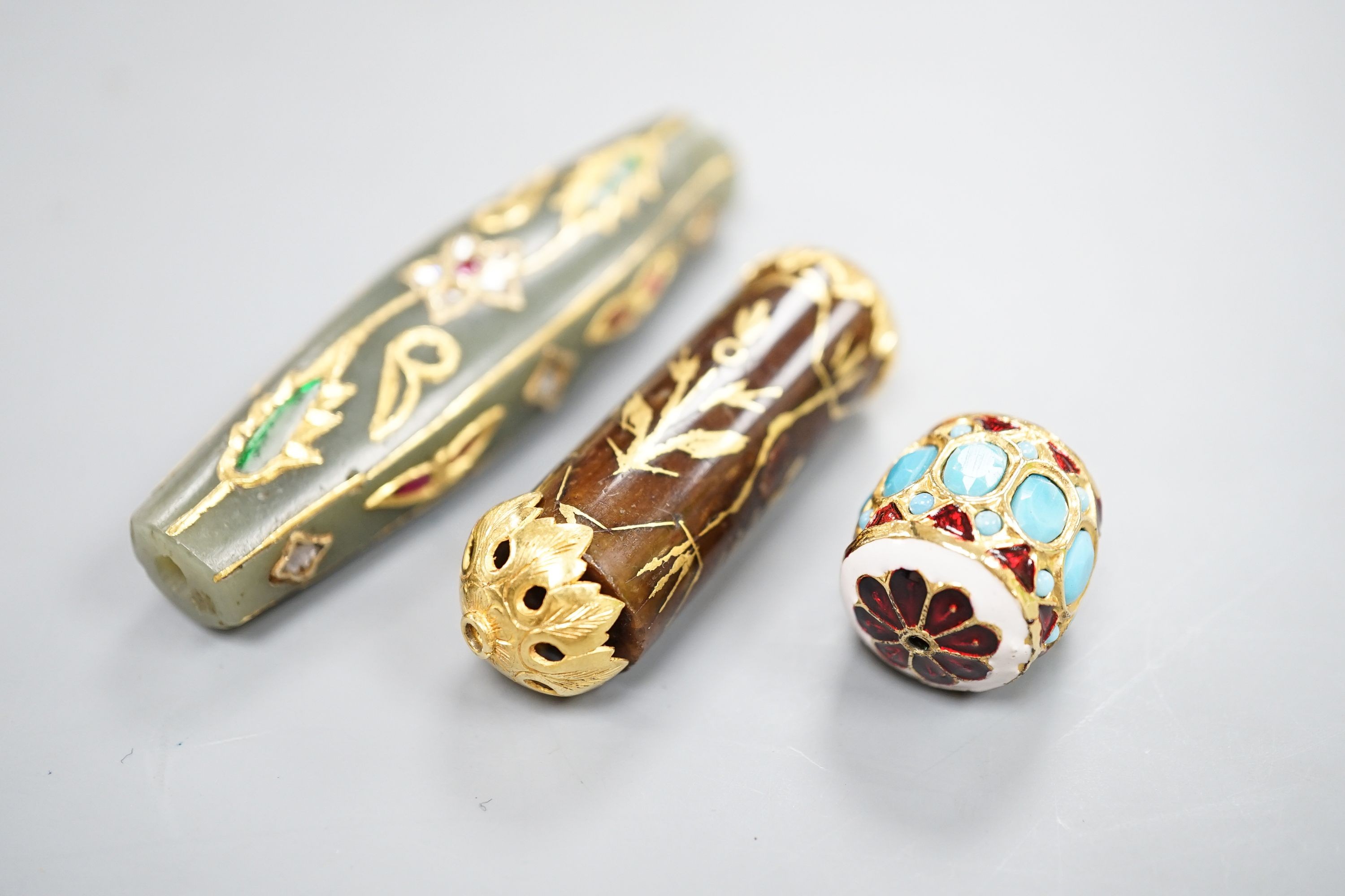 Three assorted Indian curios including gem and diamond set and enamelled, largest 7cm